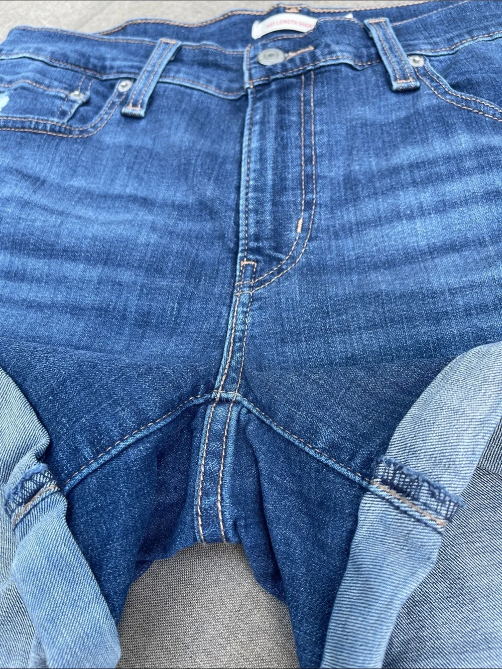 LEVI’S Mid-Length/Mid-Rise Distressed Denim Shorts